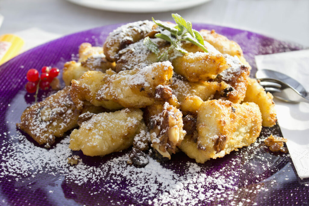 Kaiserschmarren served on purple plate